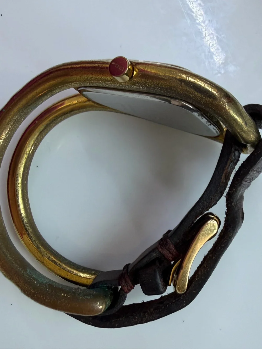 Bathed 18K gold-leather and metal watch